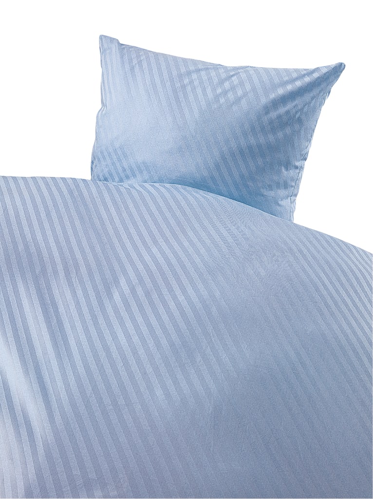 Der Bettbezug mit Diagonalstreifen ist mit einem Hotelverschluss und Bogenabnähern ausgestattet. Der passende Kissenbezug kann separat bestellt werden. Bild 1