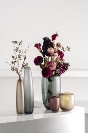 7-teiliges LEONARDO Dekoset mit Vasen und Blumenbouquets.