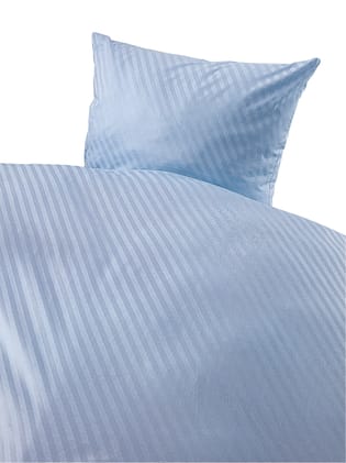 Der Bettbezug mit Diagonalstreifen ist mit einem Hotelverschluss und Bogenabnähern ausgestattet. Der passende Kissenbezug kann separat bestellt werden. Bild 1