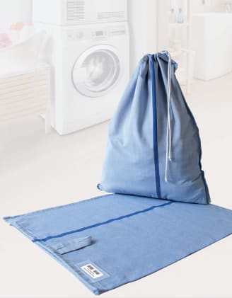 Bewohner-Wäschesack mit 6 kg Volumen, Beschriftungslasche & Trageschlaufe. Beidseitig verwendbar – ideal für flexiblen & hygienischen Wäschetransport. Bild 1